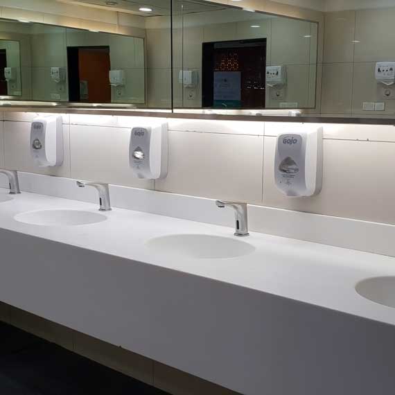 Cleaning and sanitizing shower and locker rooms