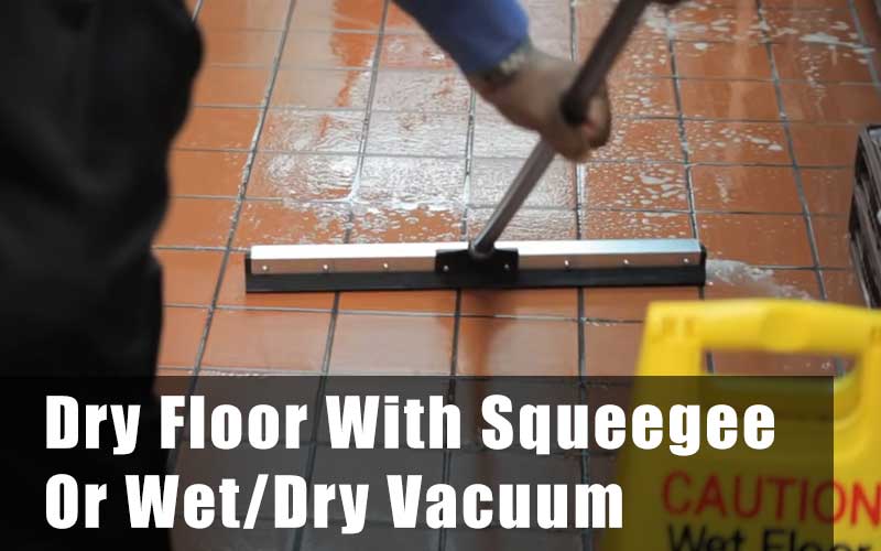 Dry restaurant floor with squeegee