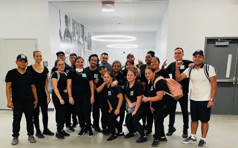 Team of cleaning professionals and supervisors