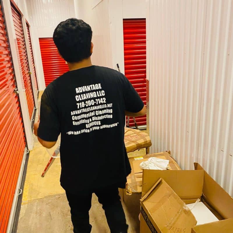 Employee cleaning a warehouse in NYC