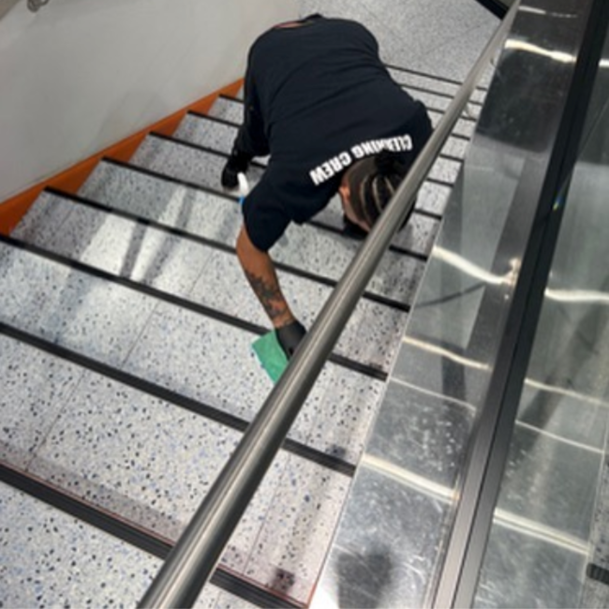 Cleaning vinyl stairs with eco-friendly cleaning products, at major retail store