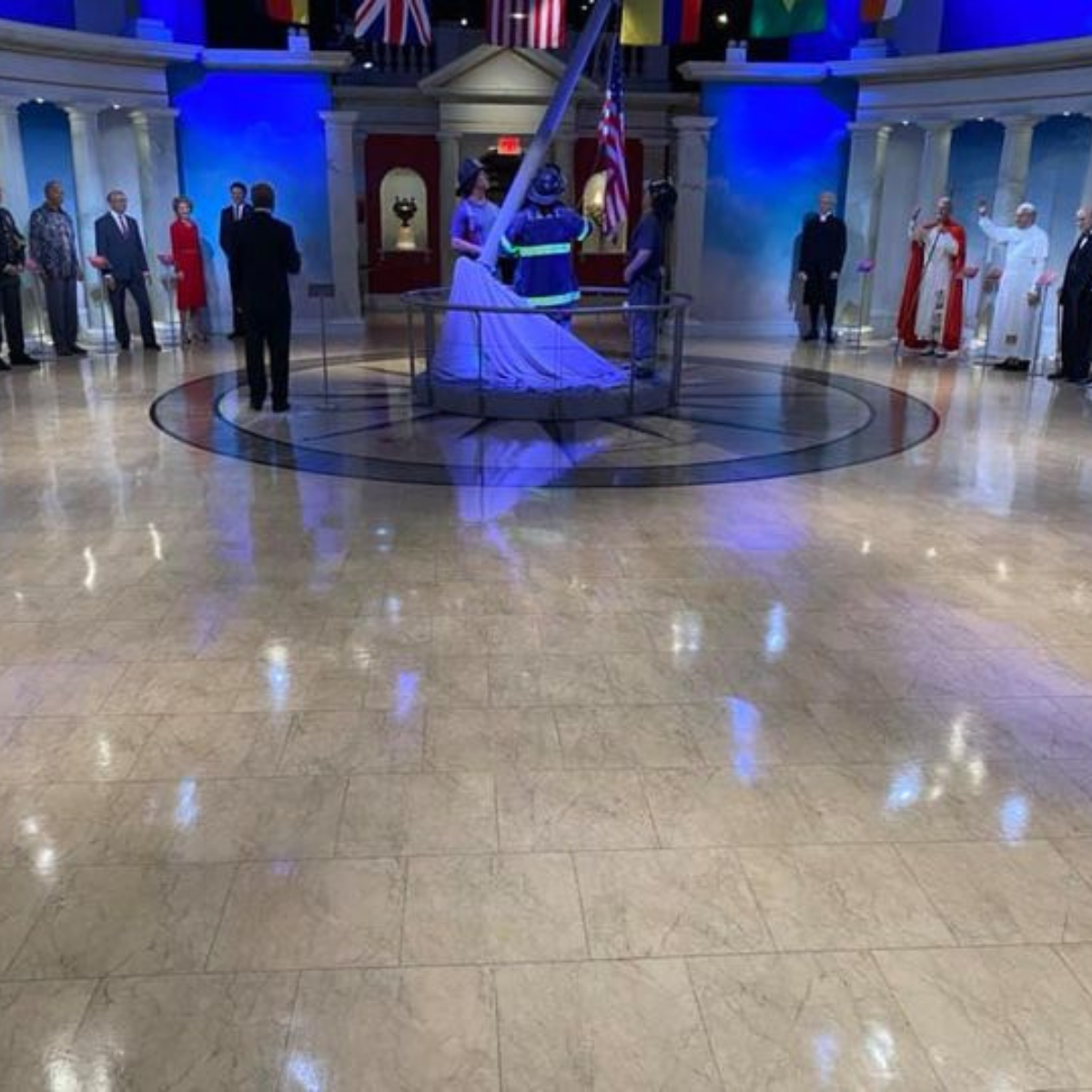 Detailed cleaning of ceramic tile floor at major tourist attraction