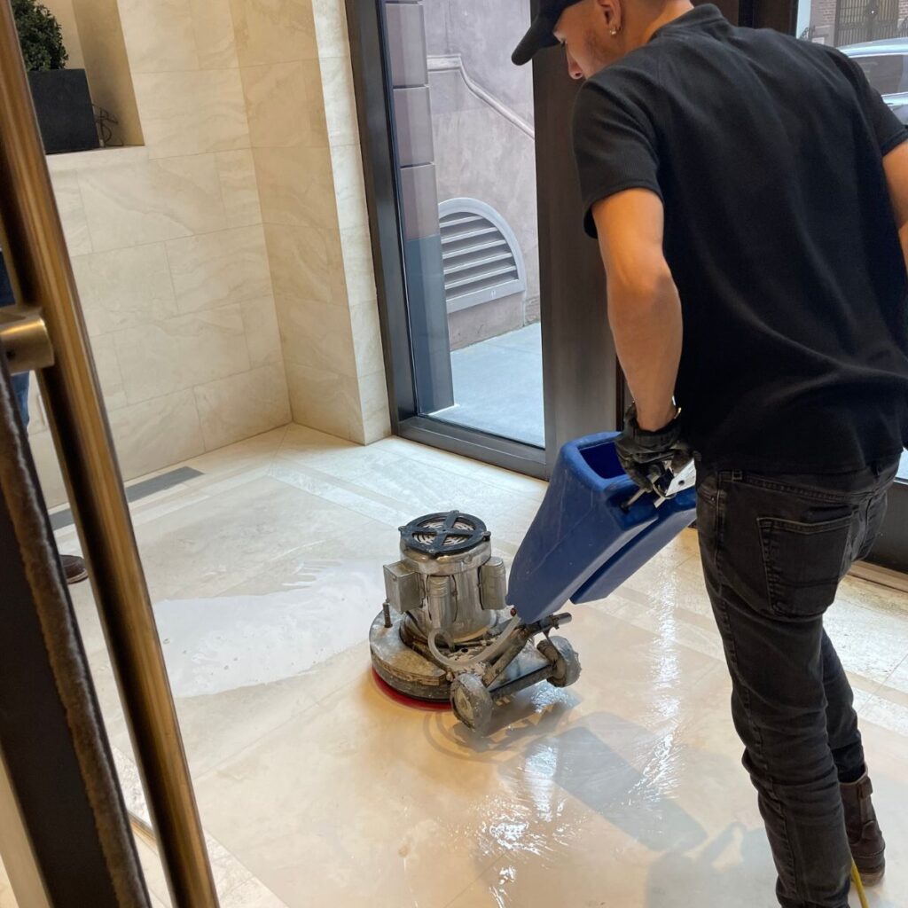 Deep cleaning marble floors in office