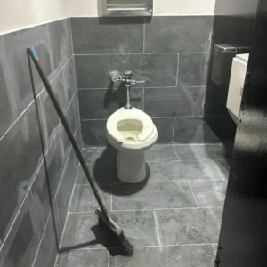 Post-renovation cleaning of restroom in Manhattan tourist attraction
