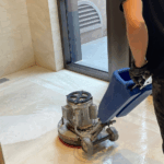 Cleaning a floor with mixed marble and tile