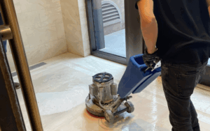 Cleaning a floor with mixed marble and tile