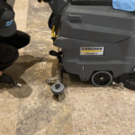 Cleaning marble floor in NYC Class A office building