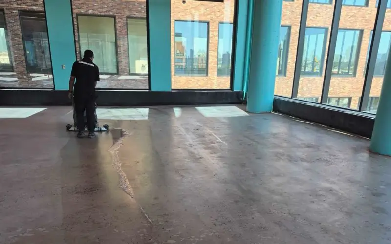 Final clean - concrete floor cleaning post-construction in NYC office building (2)