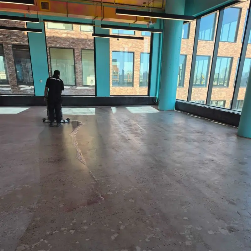 Final clean - concrete floor cleaning post-construction in NYC office building
