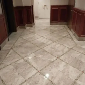 Cleaning and plishing marble floor in NYC office building