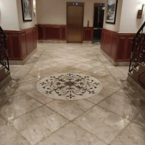 Cleaning and polishing marble floor with tiles and mosaic