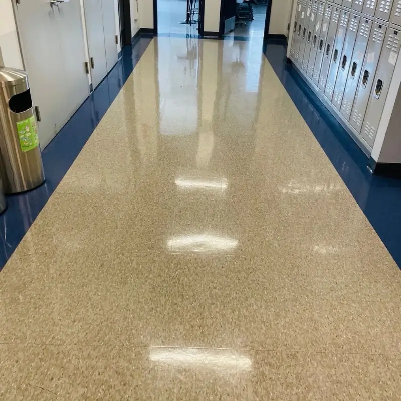 After Picture - Professional cleaner cleaning vinyl floor in NYC charter school hallway After Picture - Professional cleaner cleaning vinyl floor in NYC charter school hallway