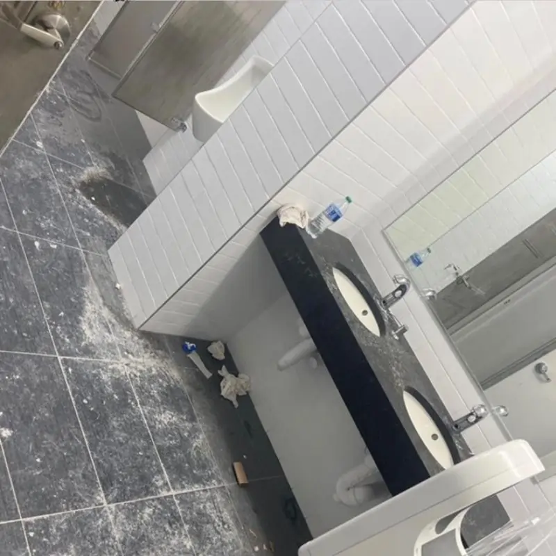 Before Picture - Post-renovation cleaning of restroom in NYC charter school