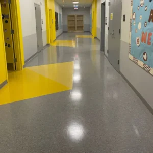 Before Picture - Vinyl floor strip and wax in NYC charter school hallway after completion