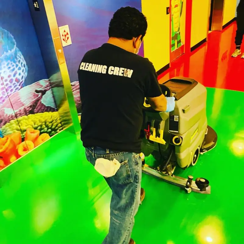 Buffing vinyl floor with auto scrubber at tourist attraction in Rutherford NJ