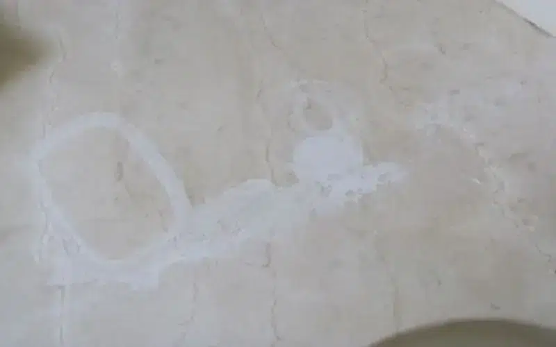 Marble Etching (Acid Damage) on white marble