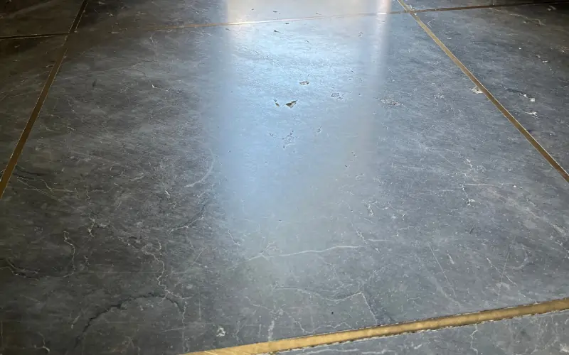 Marble floor scratches from high foot traffic