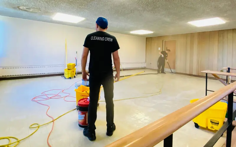 Advantage Cleaning crew stripping and waxing VCT floor a small charter school in NYC Advantage Cleaning crew stripping and waxing VCT floor a small charter school in NYC
